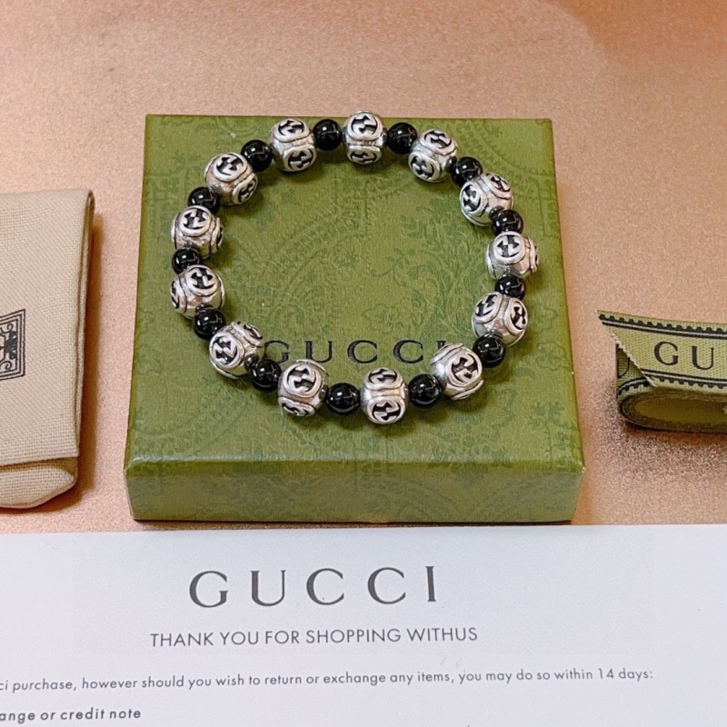 G*u*i bracelets